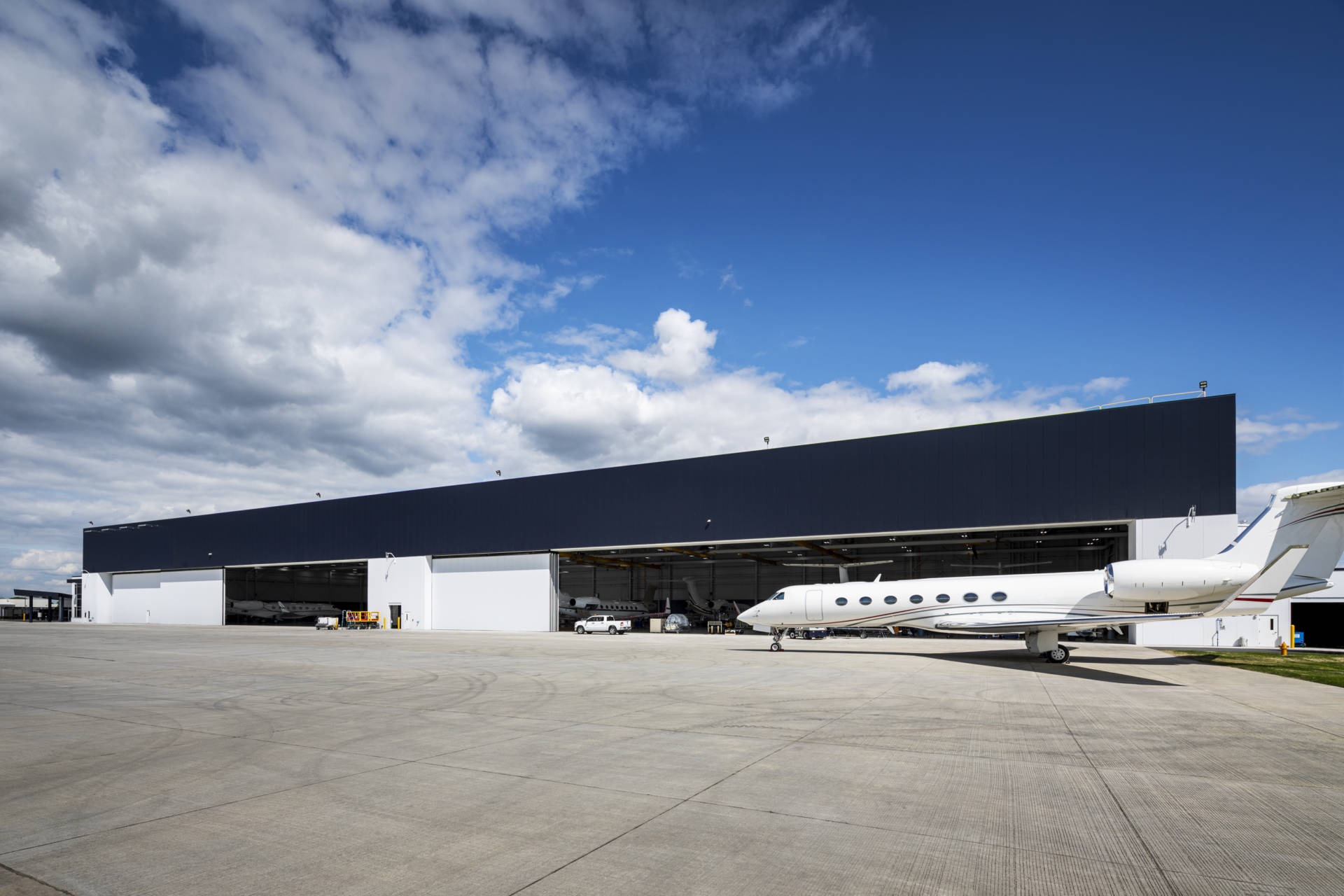 Outside of Gulfstream North Hangar with plane